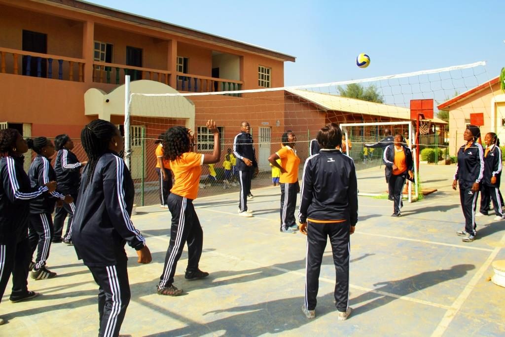 Teachers playing Volley Ball
